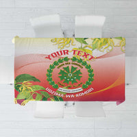 Personalized tablecloth with Comoros crest, red-purple gradient, and green ylang ylang floral