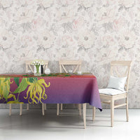 Tablecloth in red and purple with green ylang ylang floral print across dining table