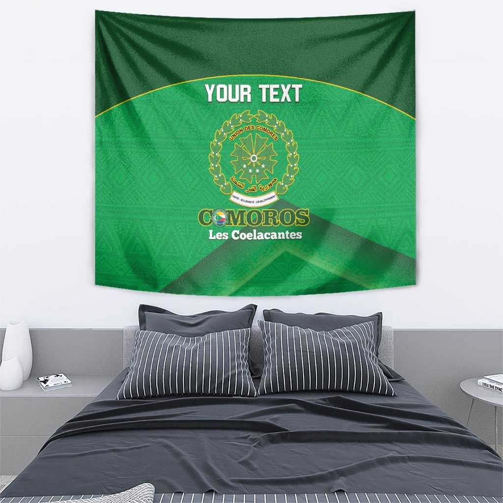 Green football tapestry with gold circular crest, 'YOUR TEXT', and 'COMOROS Les Coelacantes'