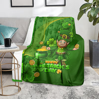 Green St. Patrick's Day blanket with cartoon leprechaun, shamrocks, and 'Happy St. Patrick's Day' lettering