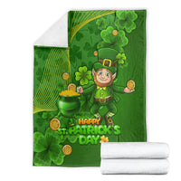 Green St. Patrick's Day blanket with leprechaun, shamrocks, and 'Happy St. Patrick's Day' design