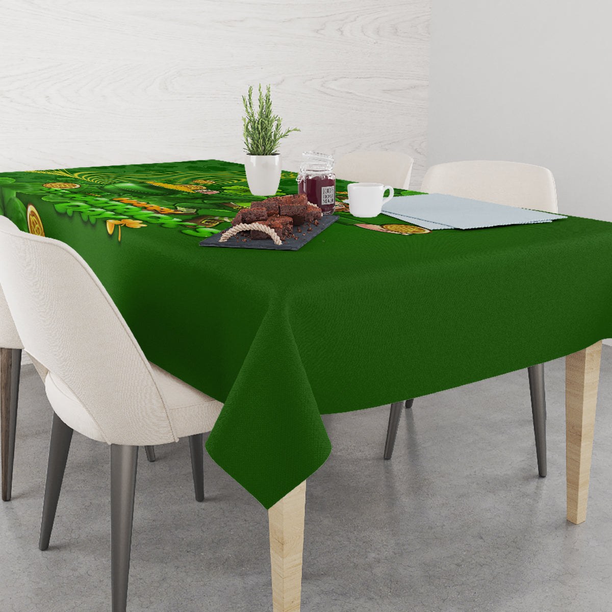 Green St. Patrick’s Day tablecloth over dining table with matching shamrock border