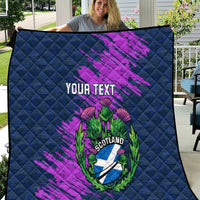 Navy blue quilt with purple brush strokes and Scotland thistle crest, “Your Text”