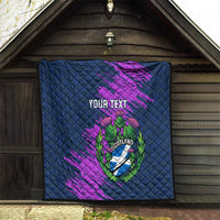 Navy blue quilt with purple brush strokes and Scotland thistle crest, “Your Text” on door frame