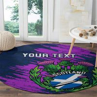 Navy round carpet with purple splatter, green thistle crest and YOUR TEXT