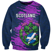 Navy sweatshirt with purple brushprint, Scotland text, thistle crest graphic, crew neck