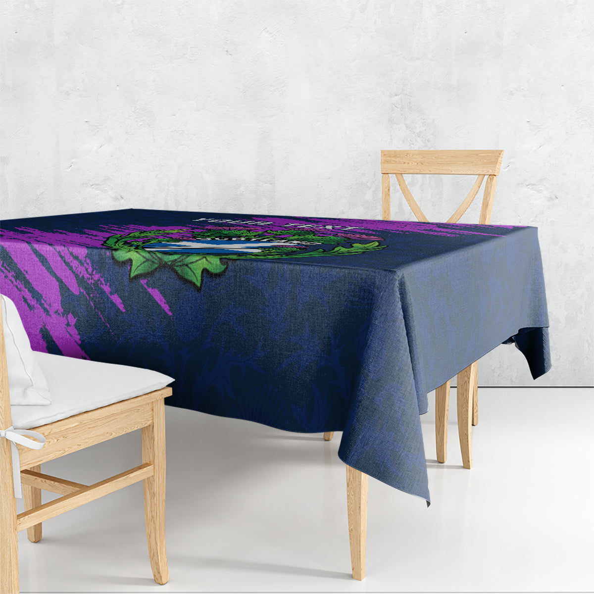 Navy blue tablecloth with purple and green Scotland thistle design, draped over table