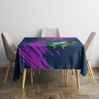 Navy blue square tablecloth with purple and green Scotland thistle crest centered