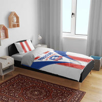 Paraguay football bedding set on bed, white duvet with blue panel and red stripe design