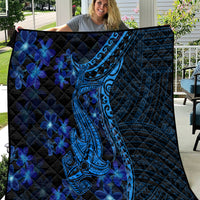 Blue Polynesian shark tattoo quilt with dark quilted pattern and blue plumeria flowers