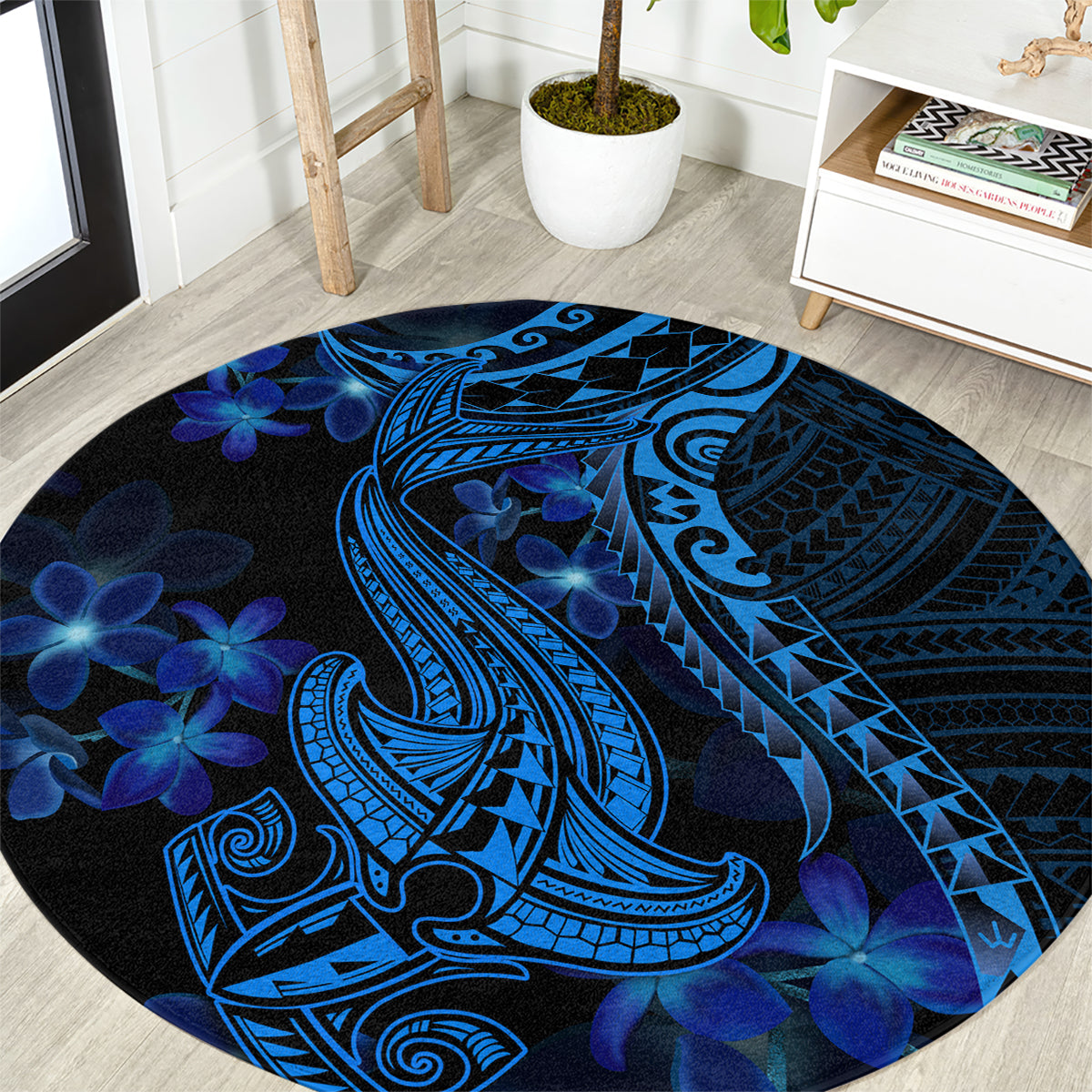 Round blue shark tattoo rug with Polynesian-style tribal lines and plumeria flower motifs