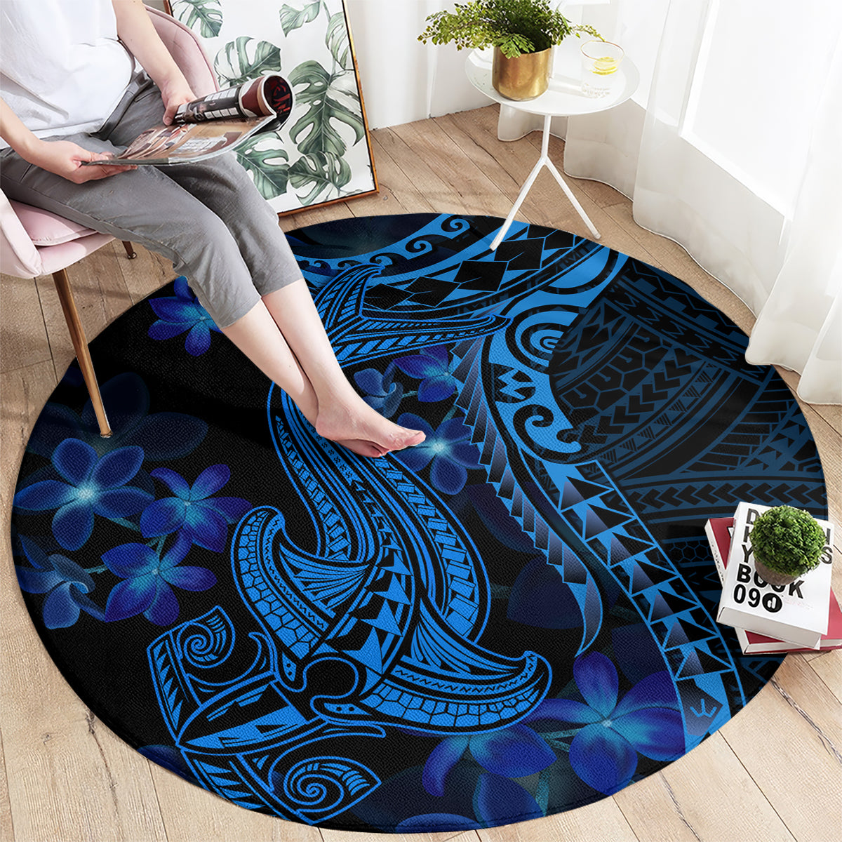 Round blue circular rug featuring a shark tattoo graphic with blue plumeria flowers