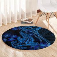 Round blue circular area rug showing a shark tattoo design with blue flower motif