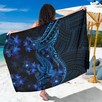 Blue polynesia-style sarong wrap skirt with dark tribal shark and plumeria floral print