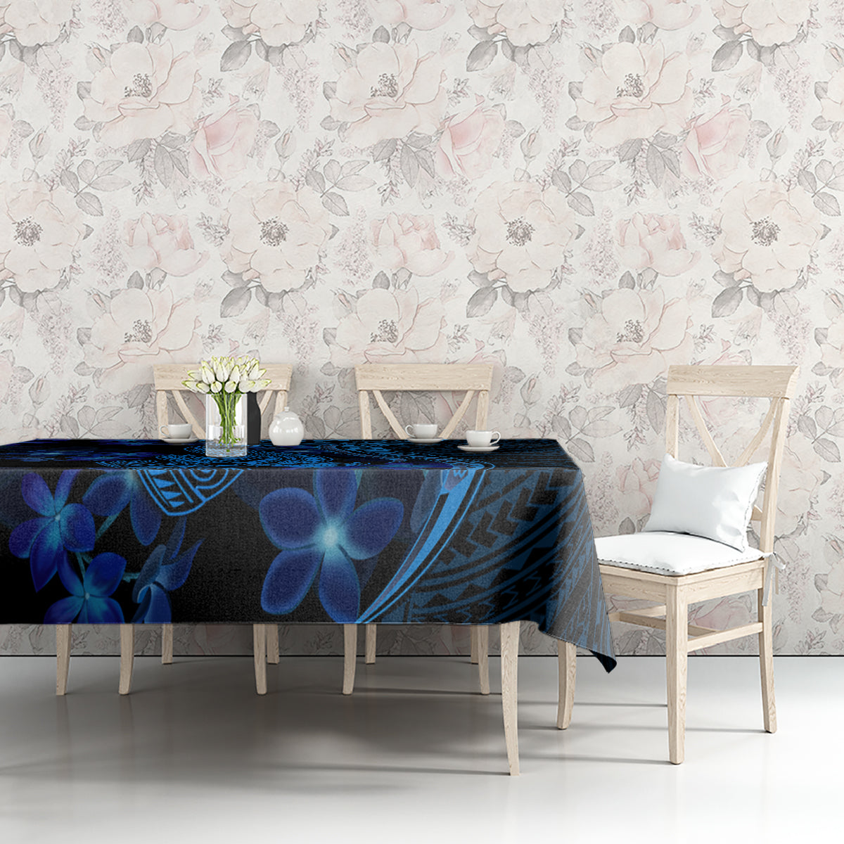 Blue Polynesian shark and floral tablecloth on dining table with matching patterns