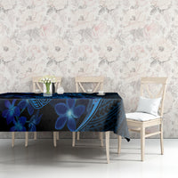 Blue Polynesian shark and floral tablecloth on dining table with matching patterns