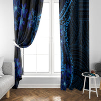Blue patterned window curtains framing a white door, with shark tattoo and plumeria motifs