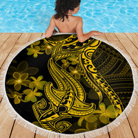 Round beach blanket with gold-and-black Polynesian shark tattoo and floral motifs, white fringe