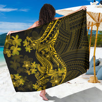 Black and gold Polynesian-style sarong with plumeria flowers and tattoo motif