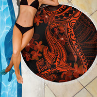 Round beach blanket with white fringe edge, black base with red/orange shark and flower pattern