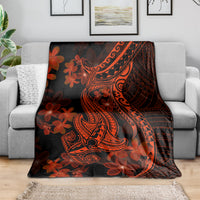 Shark tattoo style blanket draped on a sofa, red-orange plumeria flowers on dark fabric