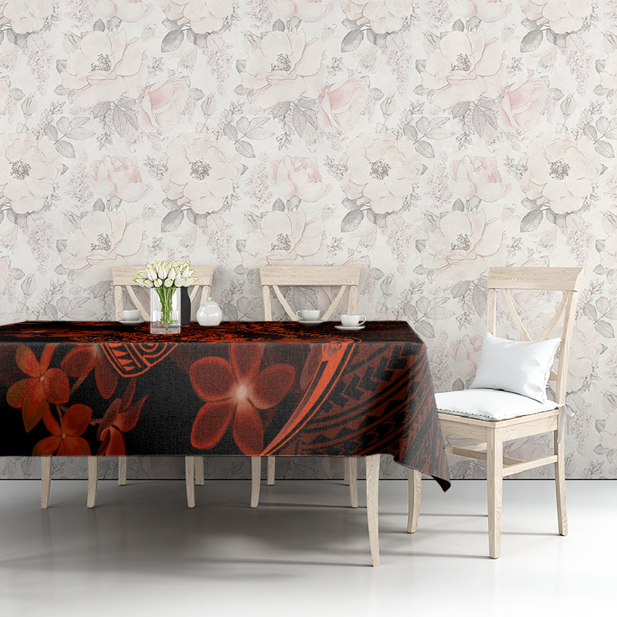 Polynesian tablecloth on rectangular table, dark black with red shark tattoo and flower design
