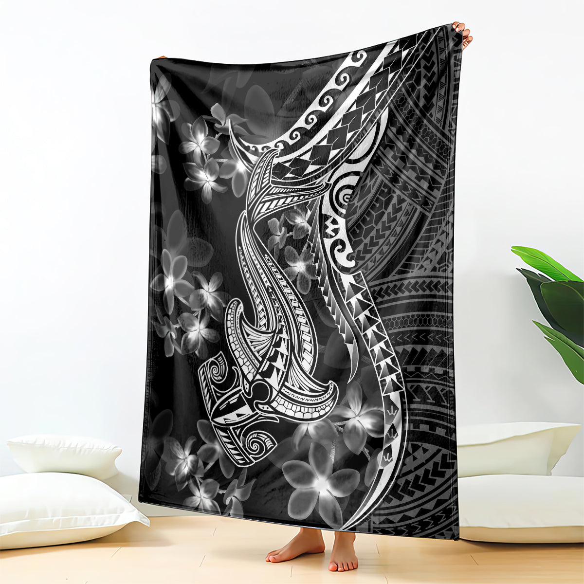 Black Polynesian-style blanket with shark tattoo and white floral plumeria motifs
