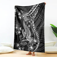 Black Polynesian-style blanket with shark tattoo and white floral plumeria motifs