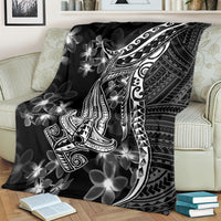 Black Polynesian blanket with ornate shark tattoo artwork and white plumeria flowers
