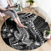 Black round carpet with white Polynesian shark, tribal patterns, and plumeria flowers