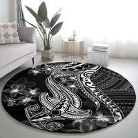 Black round carpet with white Polynesian shark tattoo and circular tribal motif