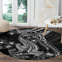 Black round carpet with white Polynesian shark tattoo and geometric tribal border