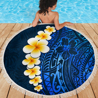 Round blue beach blanket with white fringe, tropical floral and Polynesian design