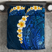 Blue tropical bedding set with white-and-yellow plumeria flowers and ornate leaf patterns