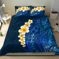 Blue tropical bedding set with plumeria flowers and dark ornate leaf-and-wave pattern