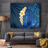 Blue tropical tapestry with plumeria flowers and ornate Polynesian leaf patterns