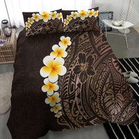 Brown tropical bedding set detail: yellow and white plumeria on tribal Polynesian print
