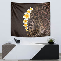 Brown tapestry wall hanging with plumeria blossoms and detailed Polynesian leaf and wave motifs