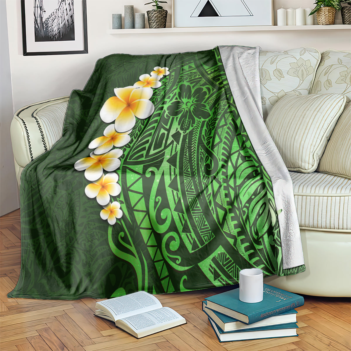 Green tropical blanket with plumeria blooms and bold leaf motif
