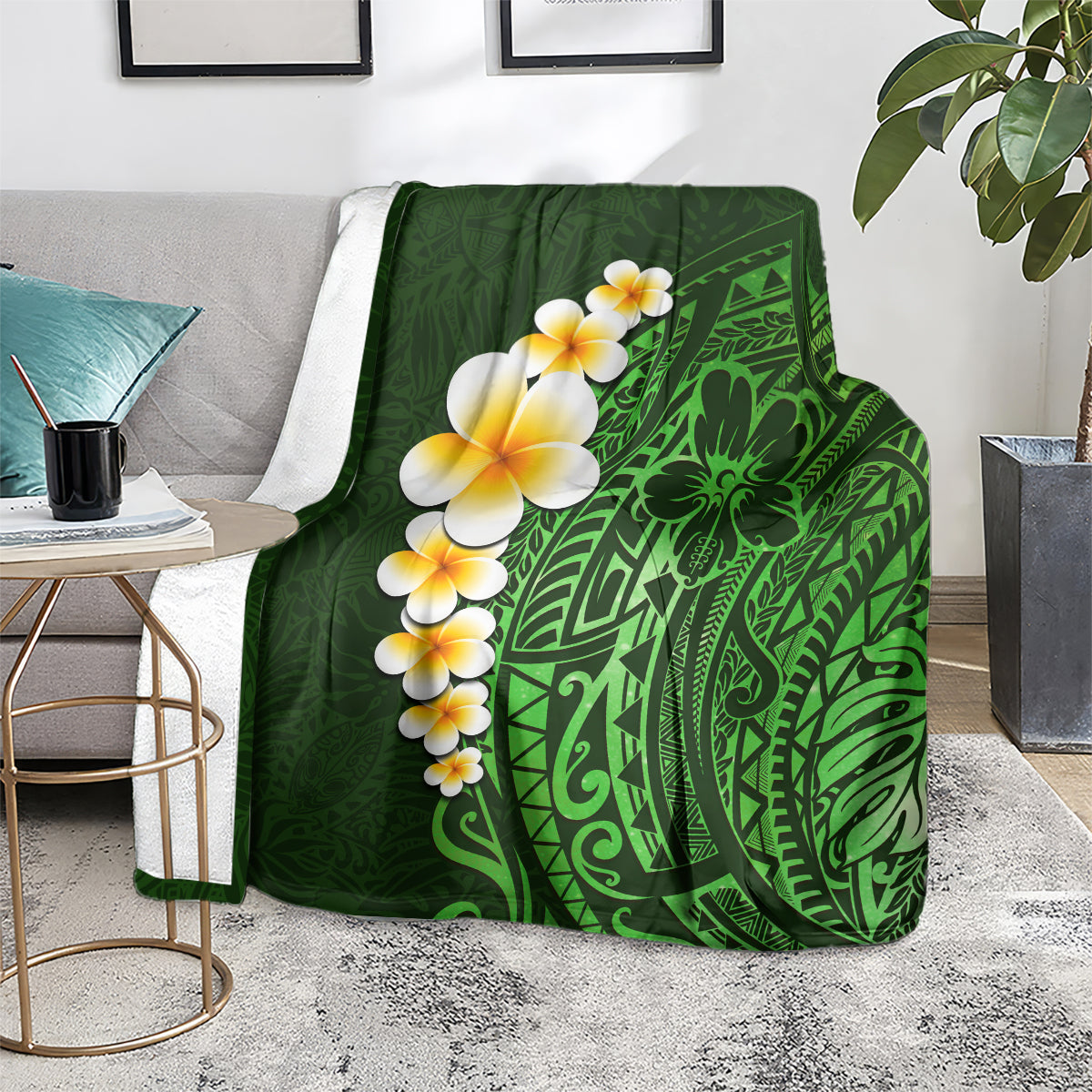 Green plumeria and Polynesian leaf blanket on couch with decorative pattern