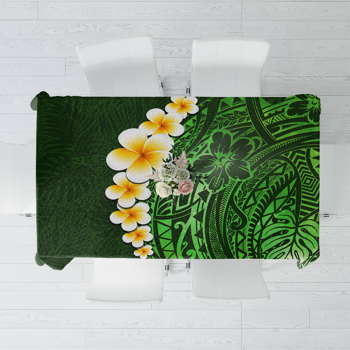 Green tropical tablecloth with plumeria flowers and patterned Polynesian leaf design
