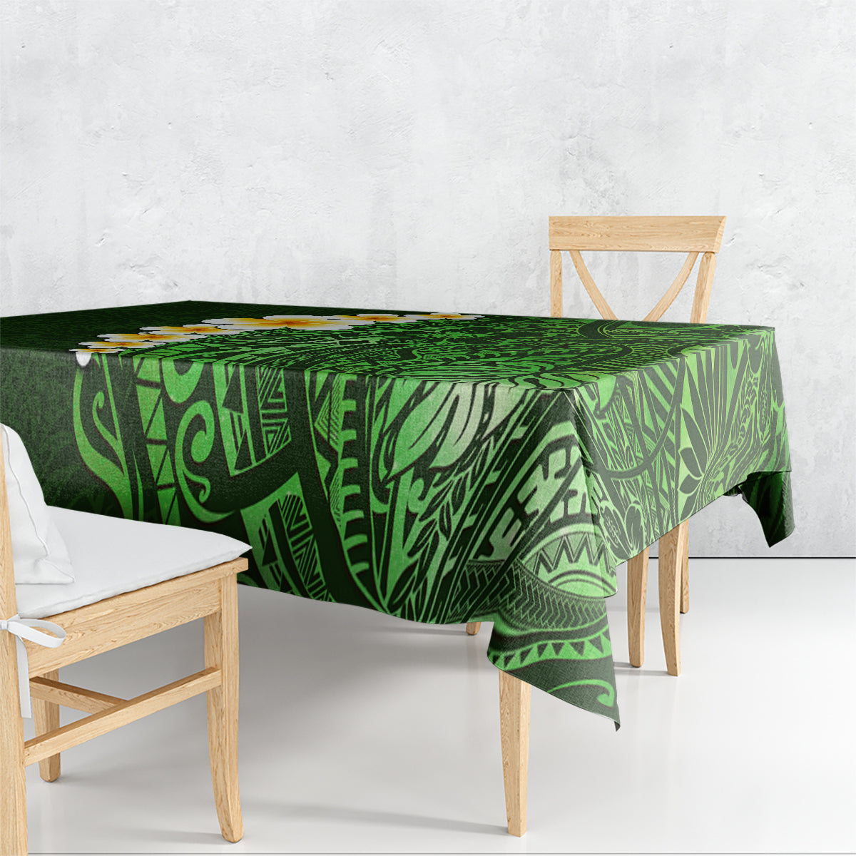 Green tropical tablecloth with geometric leaf and tiki-style patterns
