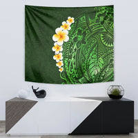 Green tapestry featuring plumeria flowers and patterned Polynesian tropical leaves
