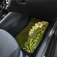 Lime green car floor mat with white plumeria and Polynesian tribal pattern in rear seat
