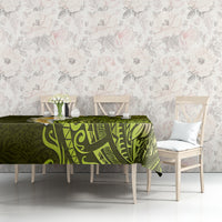 Lime green tablecloth with dark-and-light leaf and geometric Polynesian pattern, straight on