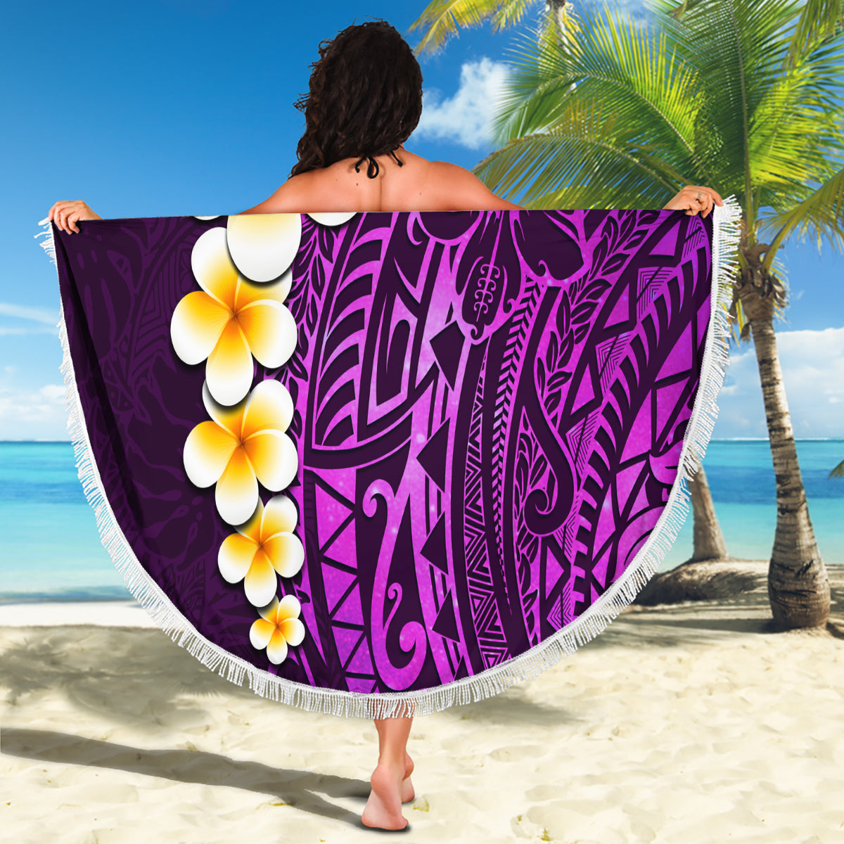 Purple round beach blanket with plumeria flowers and Polynesian tribal print, fringed edge