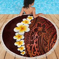 Round beach blanket with maroon-red Polynesian pattern, yellow-white plumeria flowers, white fringe