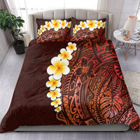Red bedding set with yellow plumeria appliques and intricate tribal design, square pillowcases