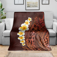 Draped red-brown tropical blanket with plumeria blossoms and Polynesian geometric pattern