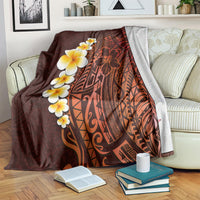 Red-brown tropical blanket with plumeria blossoms and dark orange Polynesian motifs